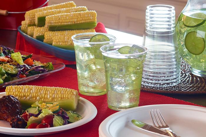clear party cups on a table for a BBQ