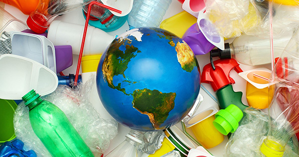 recycled plastics surrounding earth globe