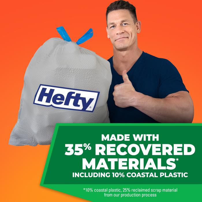 John Cena holding a Hefty Trash Bag